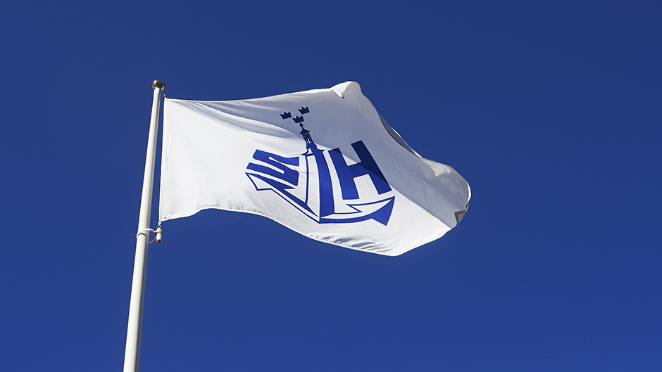 Ports of Stockholm´s flag waving in the wind