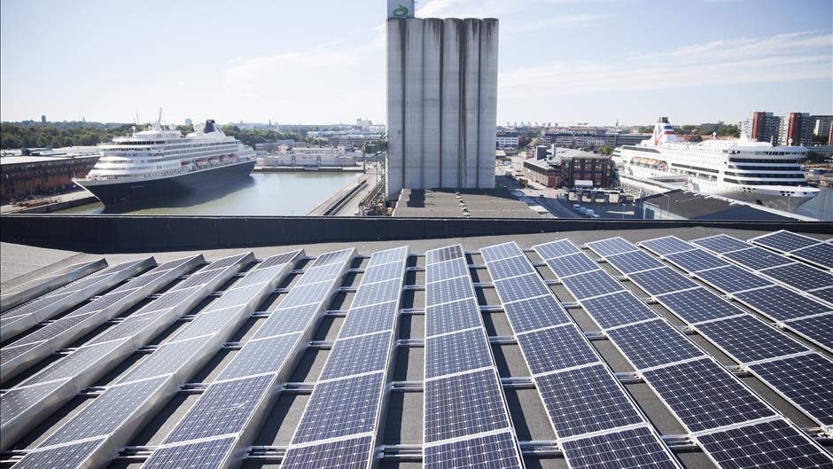 Photo voltaic system on the roof of building Magasin 6 in Frihamnen port